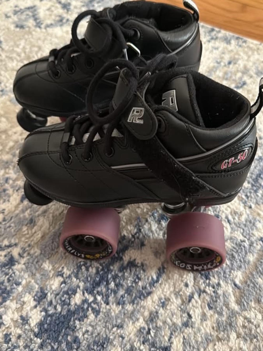 Black Kids Sure Grip Speed Skates with purple Wheels